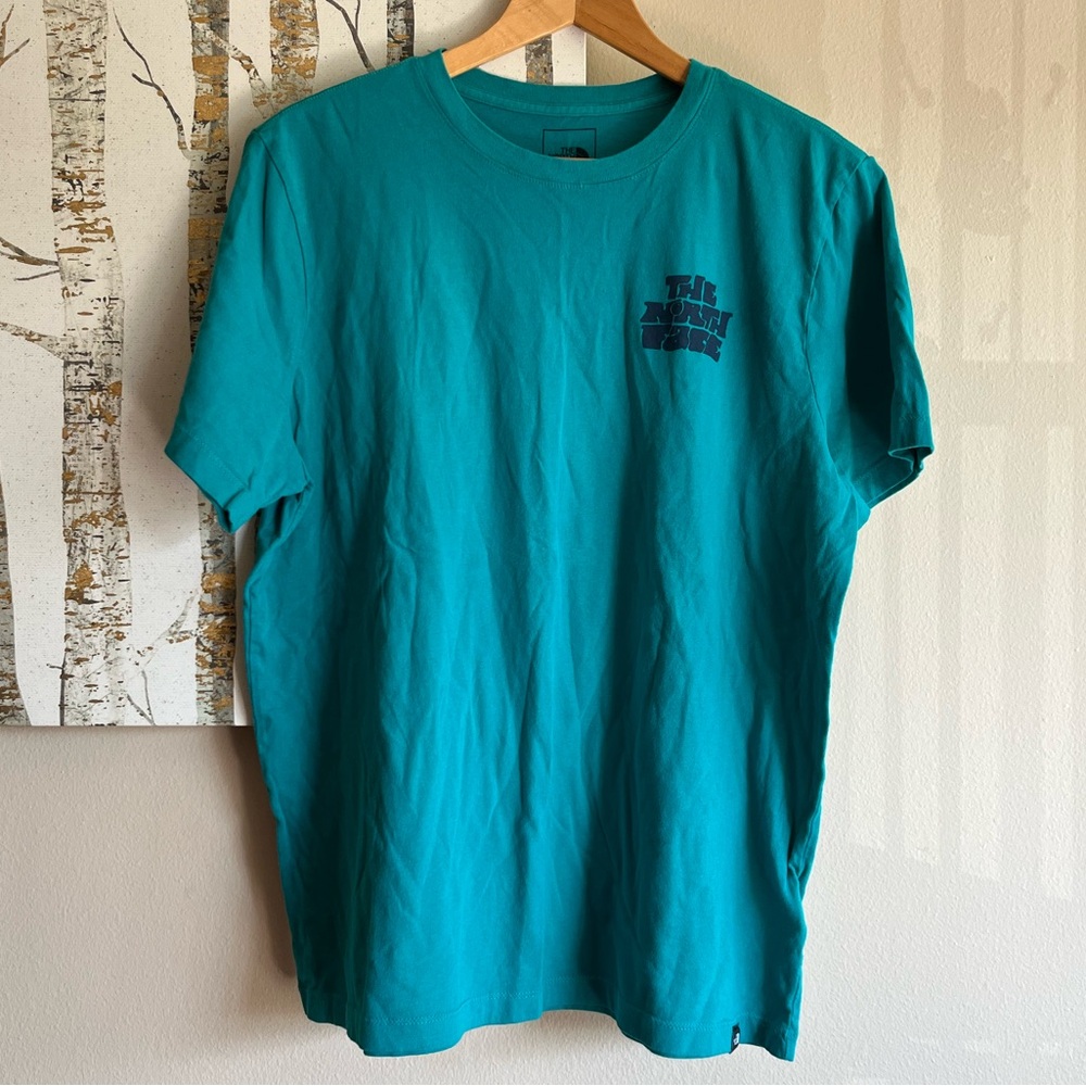 The North Face tshirt women’s teal size XL never stop exploring